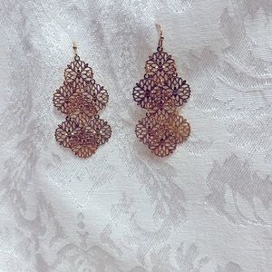 Gold tone costume pierced earrings